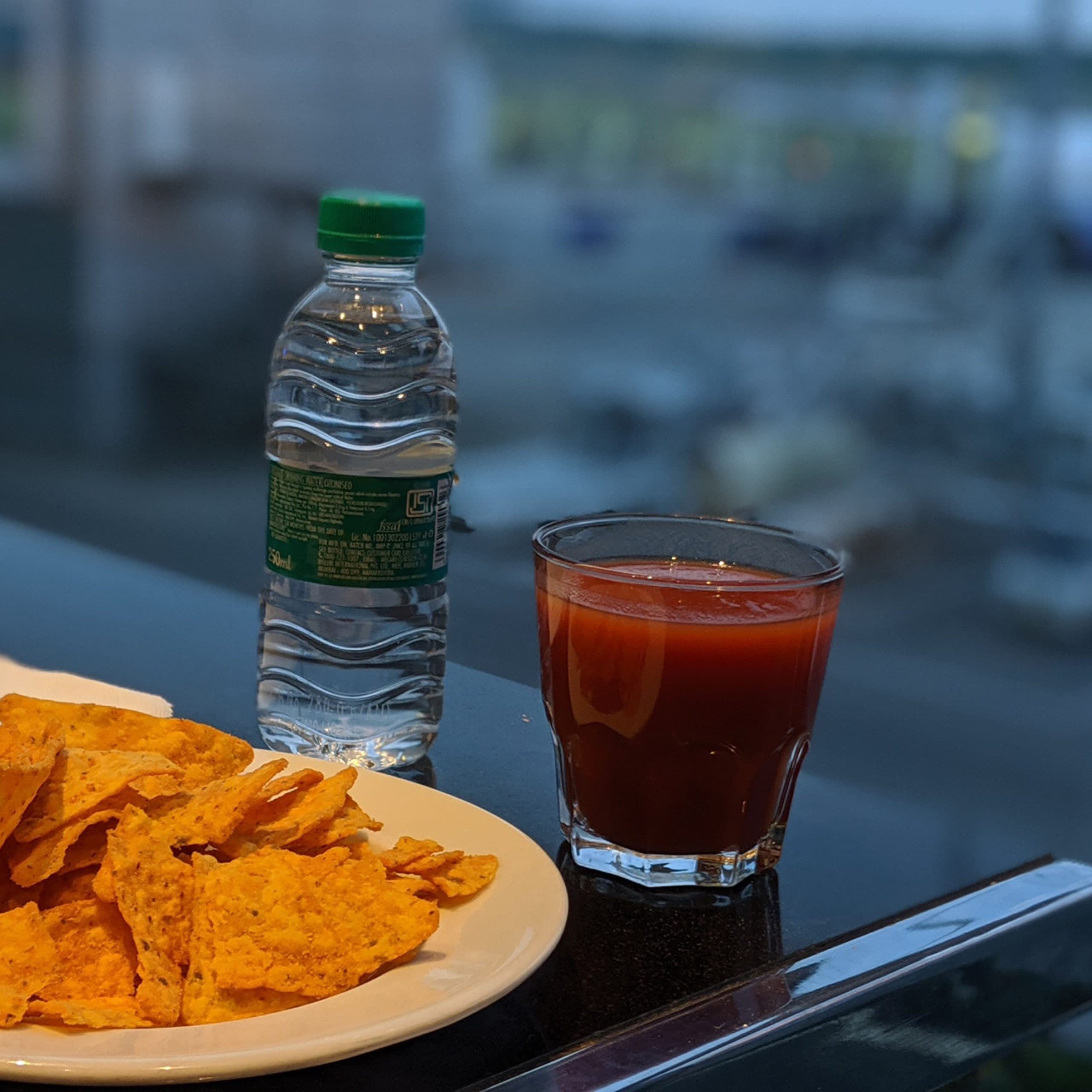 Food and drinks laid out in an airport lounge dining area
