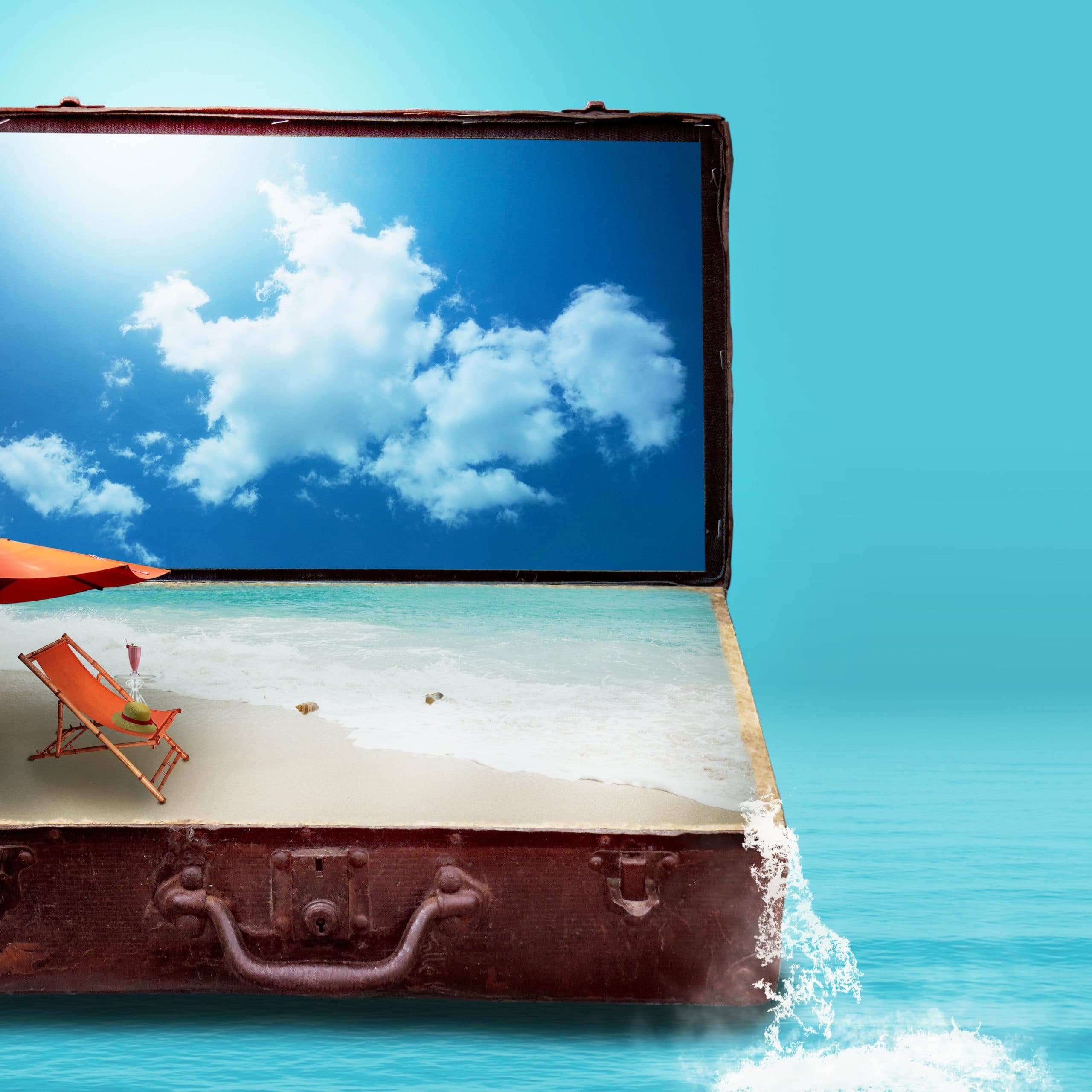 Open suitcase packed with layered clothing for a European trip